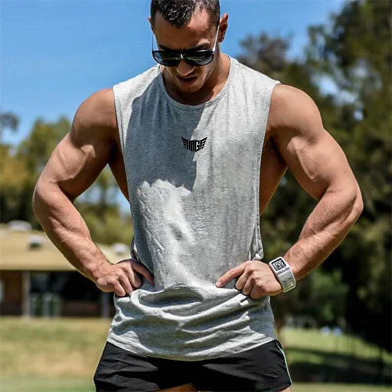 Bodybuilding Tank Tops Men Sports Sleeveless shirt Muscle guys Vest Fitness Drop Armhole Solid Tops Tees Cotton Gym Singlets